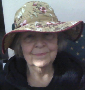 Me in my garden hat, required indoors since I got Solatube for my plants